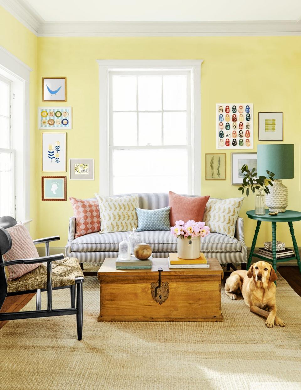 modern chippendale sofa in yellow room