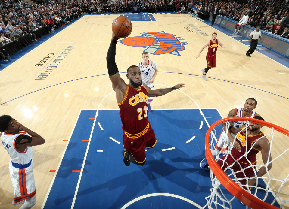 LeBron James slices through the Knicks' defense for a dunk. (Nathaniel S. Butler/NBAE/Getty Images)