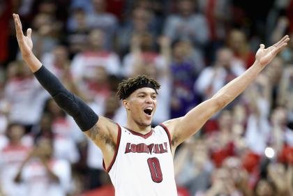 Damion Lee transferred to Louisville with the hope of playing in the NCAA tournament.  (Getty Images)