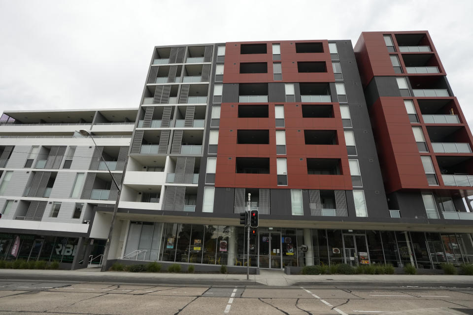 An apartment building stands on a corner in a Sydney suburb on Thursday, Aug. 4, 2022. The Sydney apartment where the bodies of two Saudi sisters were found in June is back on the rental market with a real estate ad advising their deaths were "not a random crime and will not be a potential risk for the community." (AP Photo/Rick Rycroft)