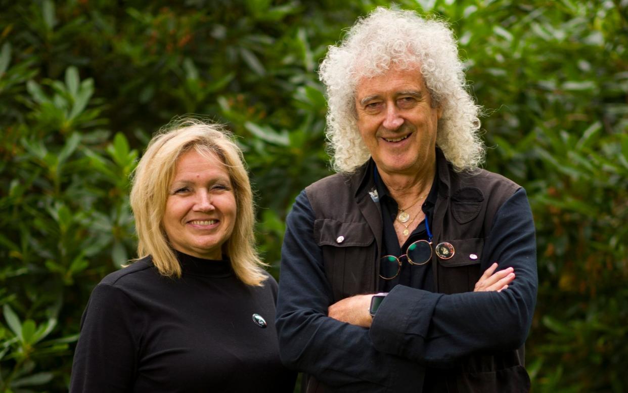 Sir Brian May and animal activist Anne Brummer in the woodland next to Save Me Trust HQ in Windlesham, Surrey