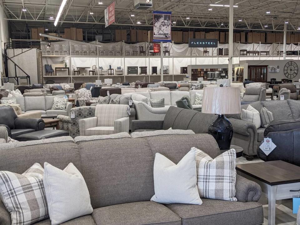 View of some of the armchairs and sofas available at Mueller Furniture & Mattress Warehouse Showroom in Fairview Heights