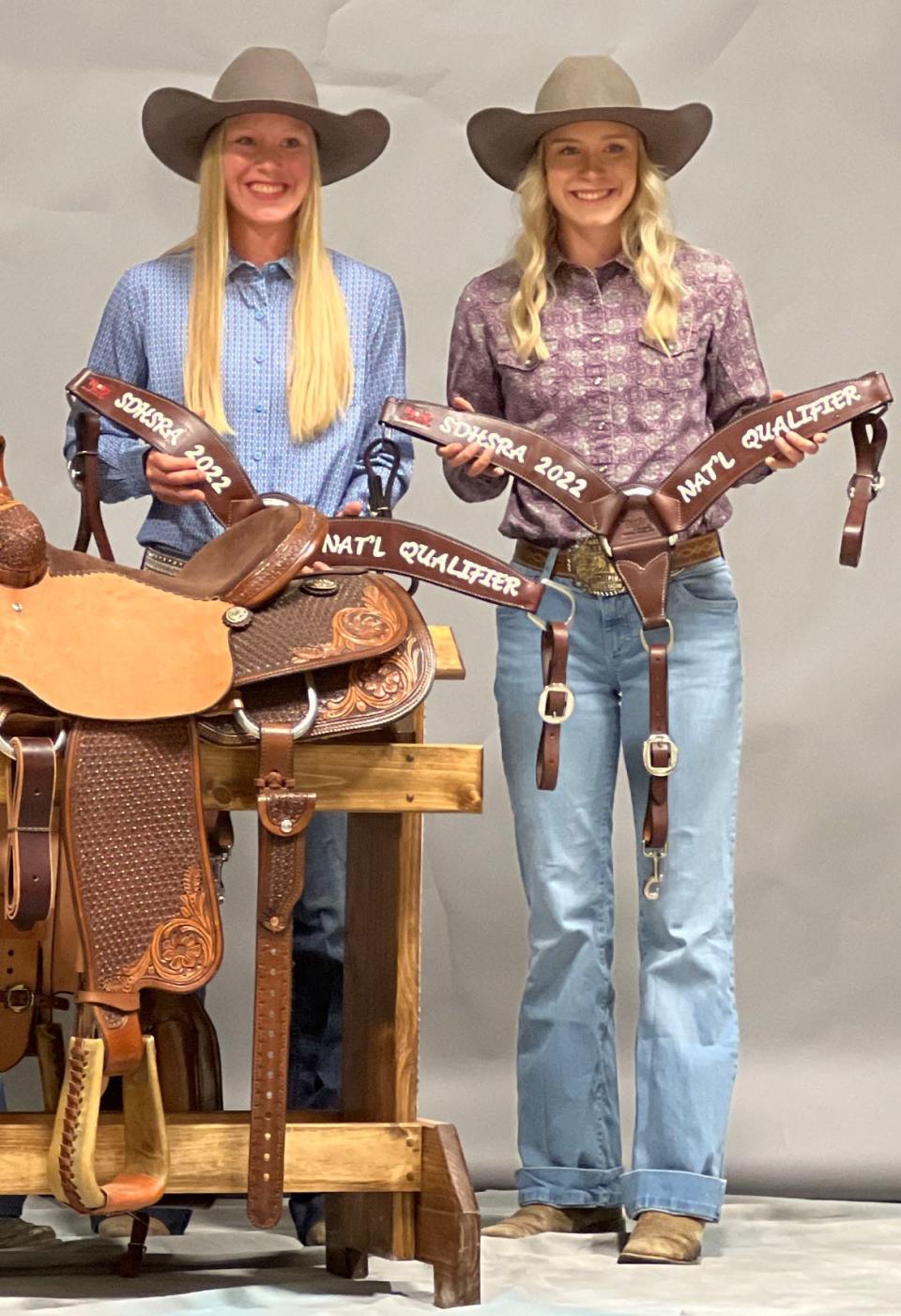 Kylie (left) and Addyson Wittnebel of Castlewood have qualified to compete in the National High School Rodeo Finals July 17-23 at Gillette, Wyo. Kylie finished third and Addyson fourth in pole bending at the South Dakota State High School Rodeo Finals last week in Fort Pierre.