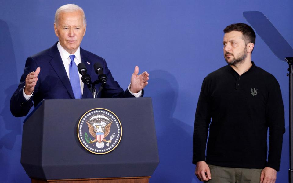 US President Joe Biden speaks alongside Ukraine's President Volodymyr Zelensky during July's Nato summit