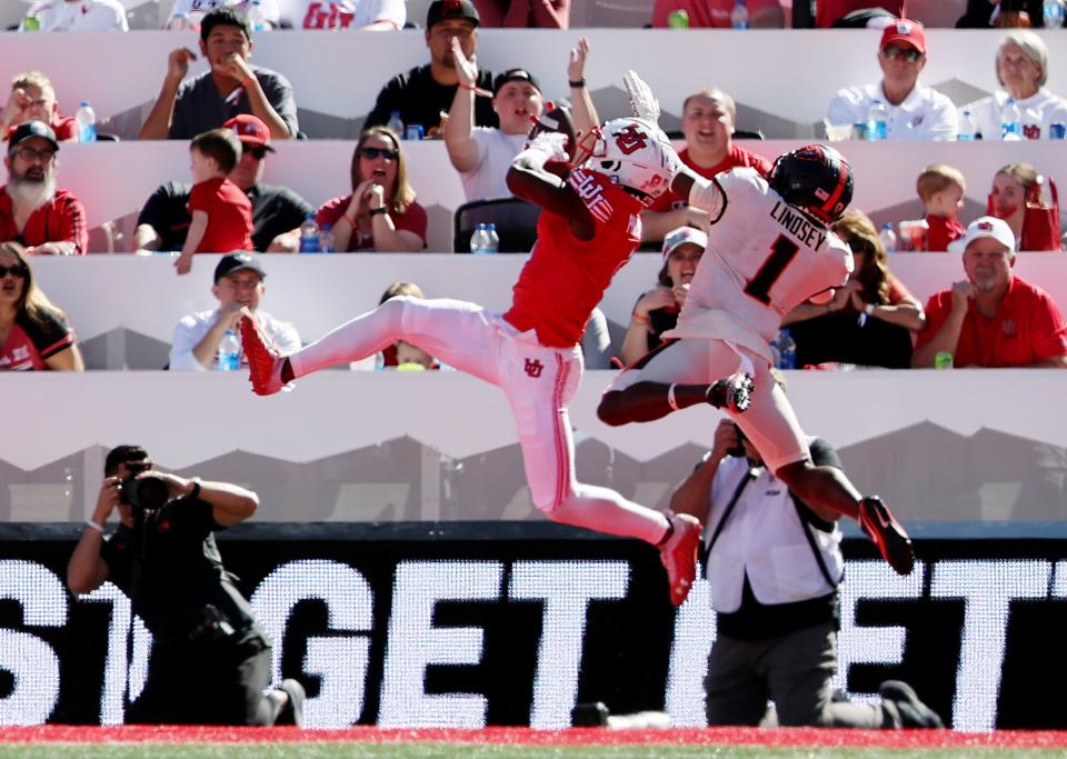 Utah Utes cornerback Clark Phillips III (1) makes an interception over Oregon State Beavers wide receiver Tyjon Lindsey (1) as Utah and Oregon State play at Rice Eccles Stadium in Salt Lake City on Saturday, Oct. 1, 2022. Utah won 42-16. | Scott G Winterton, Deseret News