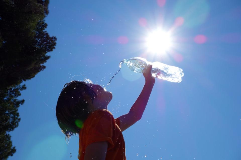 You should try and double your water intake from 1.5 litres to three litres when the weather is hot (Getty Images)