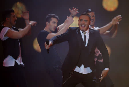 Singer Nadav Guedj representing Israel performs the song "Golden Boy" during the second semifinal, May 21, 2015. REUTERS/Leonhard Foeger