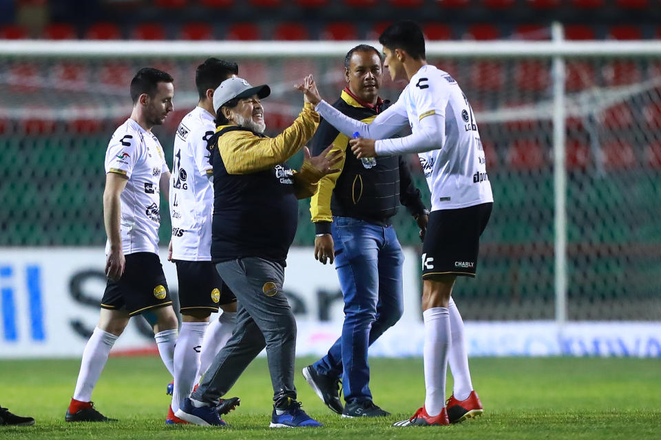 ZACATECAS, MEXICO - APRIL 27: Diego Armando Maradona, coach of Dorados de Sinaloa celebrates with his players after winning the semifinal second leg match between Mineros and Dorados as part of the Playoffs Torneo Clasusura 2019 Ascenso MX at Estadio Carlos Vega Villalba on April 27, 2019 in Zacatecas, Mexico. (Photo by Hector Vivas/Getty Images)