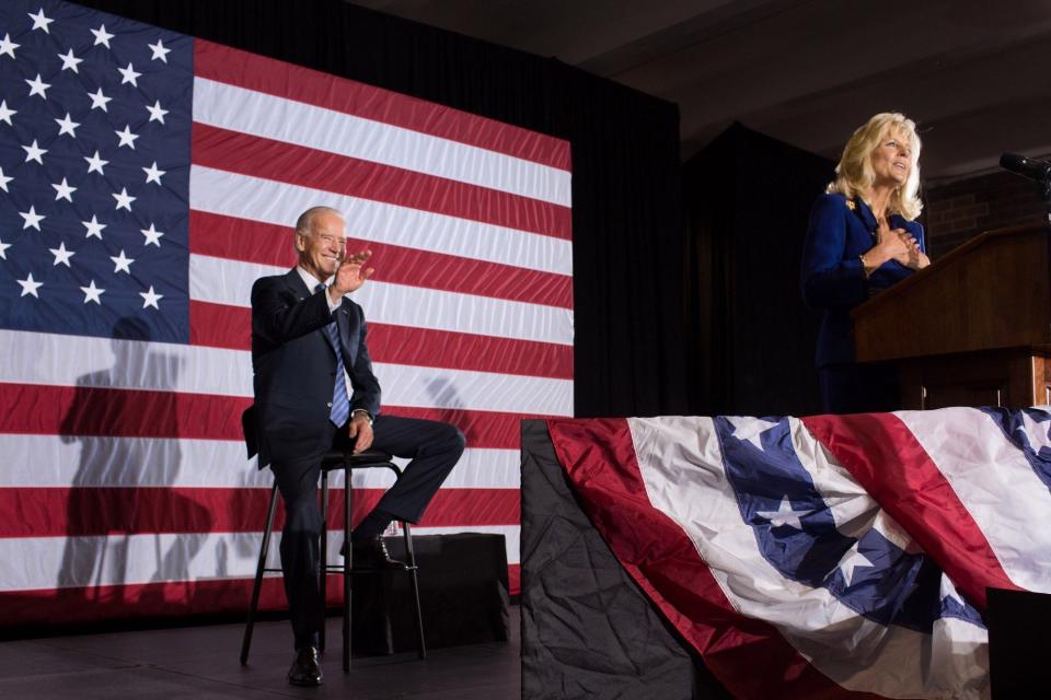 Vice President Joe Biden smiles and waves as his wife, Dr. Jill Biden, introduces him at an event in Lynchburg, Virginia. October 27,&nbsp;2012.