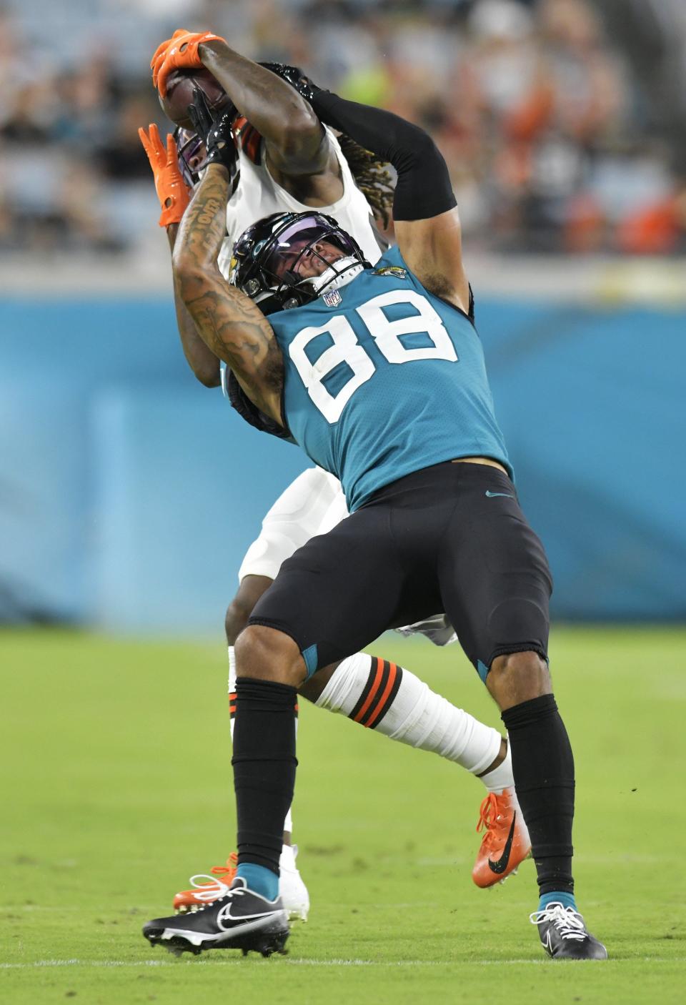 Cleveland Browns cornerback Martin Emerson Jr., snatches a pass away from Jaguars wide receiver Jeff Cotton Jr., during the second quarter of Friday's preseason game at TIAA Bank Field. Emerson returned it 74 yards to give the Browns a 14-13 halftime lead.