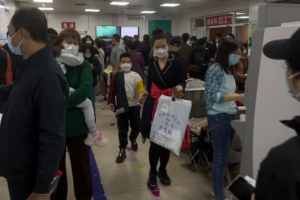 The director of Tianjin Children’s Hospital said its staff had been overwhelmed, with more than 13,171 patients were admitted to the hospital’s two campuses in 24 hours (AP Photo/Andy Wong)