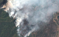<p>A satellite image shows the 416 Wildfire burning west of Highway 550 and northwest of Hermosa, Colo., June 10, 2018. (Photo: Â© 2018 DigitalGlobe, a Maxar company/Handout via Reuters) </p>