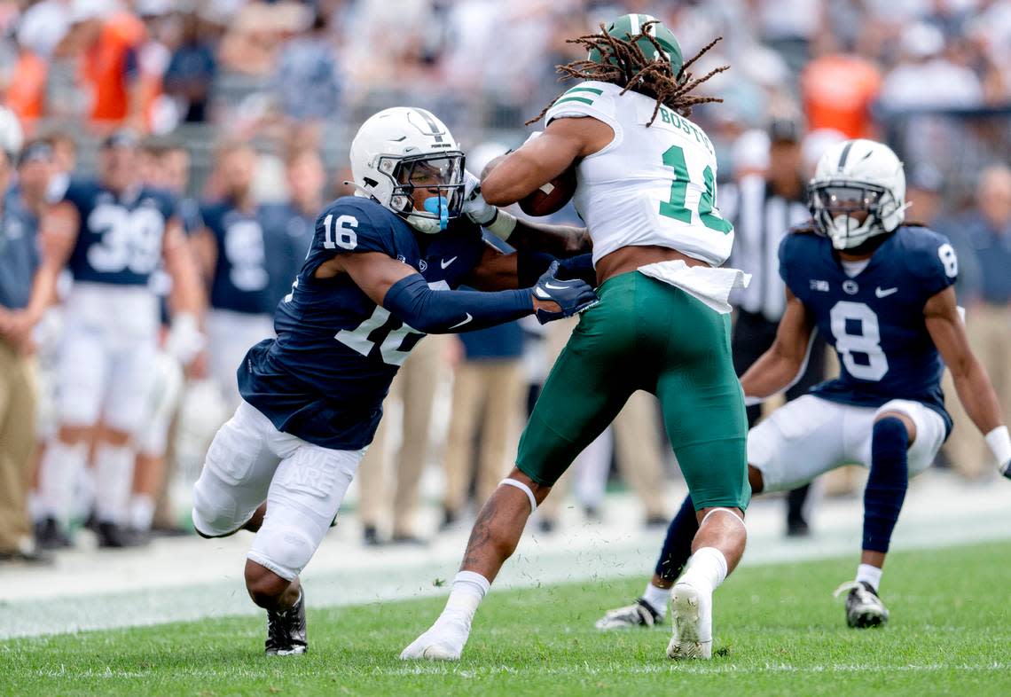 Penn State safety Ji’Ayir Brown reaches for Ohio wide receiver James Bostic during the game on Saturday, Sept. 10, 2022.