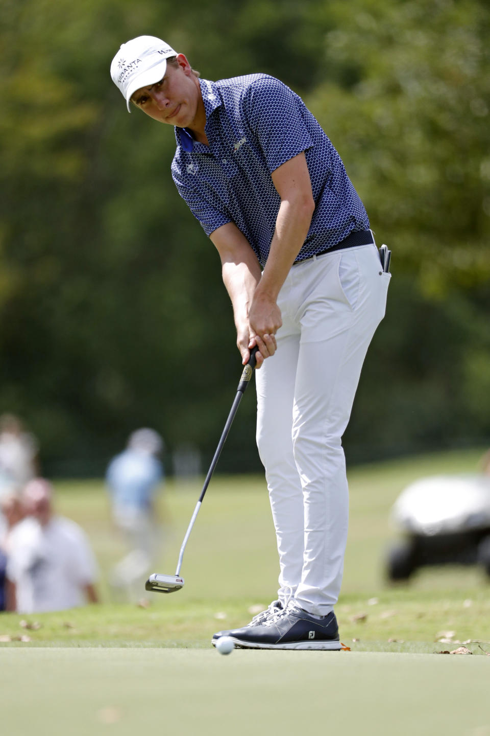 Carlos Ortiz of Mexico watches his birdie putt on the second hole during the final round of the Sanderson Farms Championship golf tournament in Jackson, Miss., Sunday, Sept. 22, 2019. (AP Photo/Rogelio V. Solis)