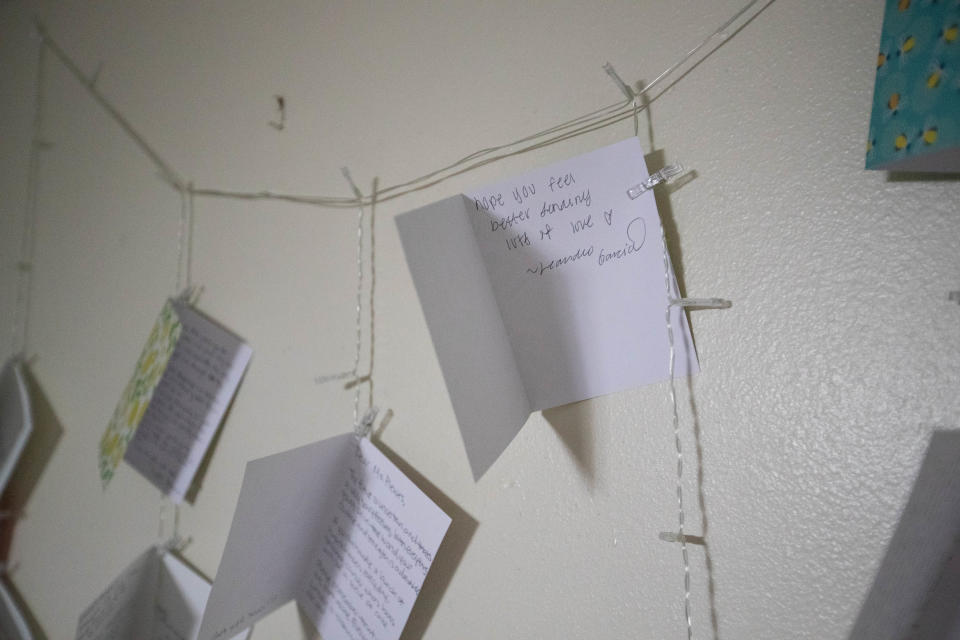 Cards from Mary Ellen Plewes' loved ones hang over her bed in her Tallahassee home. 