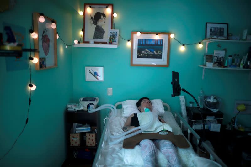 Ana Estrada, a euthanasia advocate who suffers from an incurable condition, lies in bed at her home in Lima