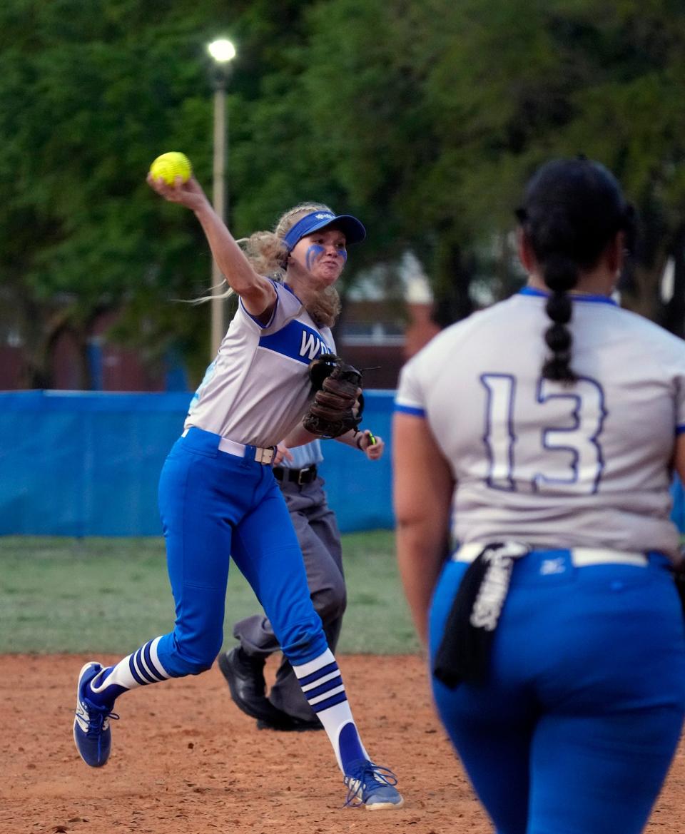Deltona's Sophie Strempel throws to first during game with Lake Howell softball at Deltona High School in Deltona, Thursday, March 7, 2024.