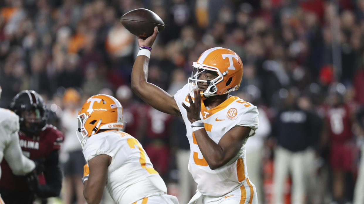 Tennessee quarterback Hendon Hooker (5) throws a short pass to the sideline during the first half of an NCAA college football game against South Carolina on Saturday, Nov. 19, 2022, in Columbia, S.C. (AP Photo/Artie Walker Jr.)