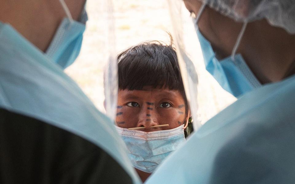 Personnel from a military health brigade check the Yanomami people in the Surucucu region -  Joedson Alves/EPA-EFE/Shutterstock