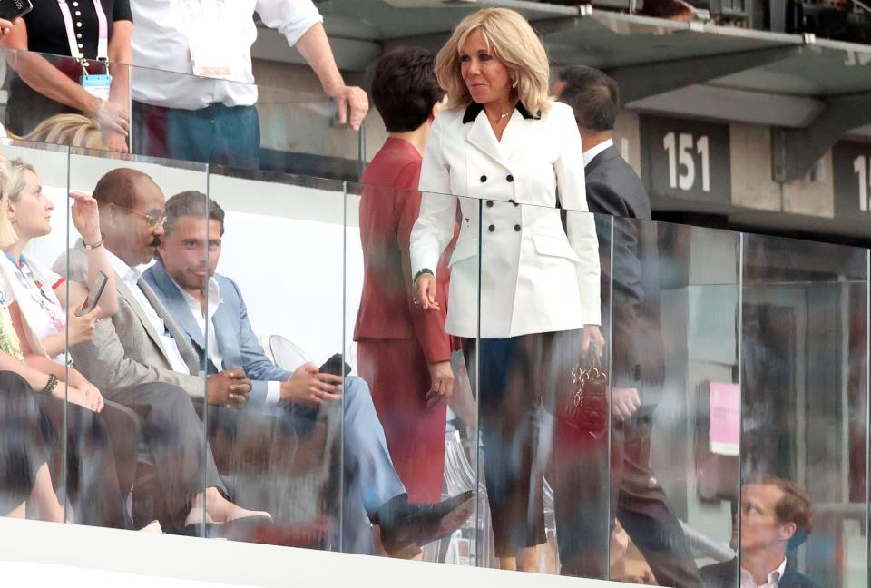 French first lady Brigitte Macron in a black and white suit at the 2024 Paris Olympics closing ceremonies on Aug. 11.