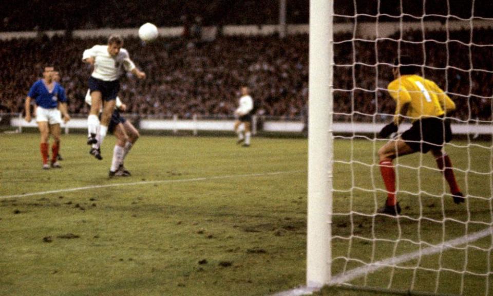 Roger Hunt heads home his, and England’s, second goal past France’s goalkeeper Marcel Aubour during their 1966 World Cup group game at Wembley.