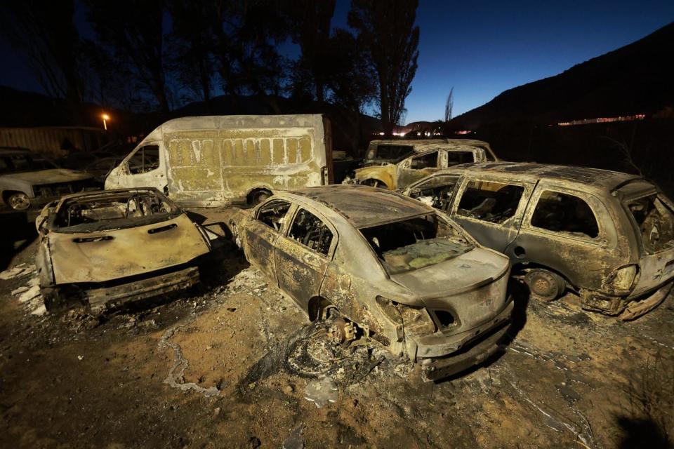 PHOTO: Vehicles sit burnt from the 'Post Fire' in Gorman, Calif., June 17, 2024.  (David Swanson/AFP via Getty Images)