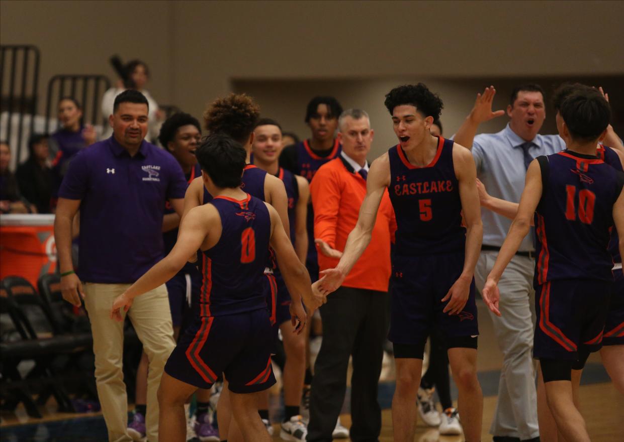 Eastlake High School players celebrate tying the score against Pebble Hills in the fourth quarter during their game at Pebble Hills High School on Jan. 2, 2023. Eastlake won the match 44-41.