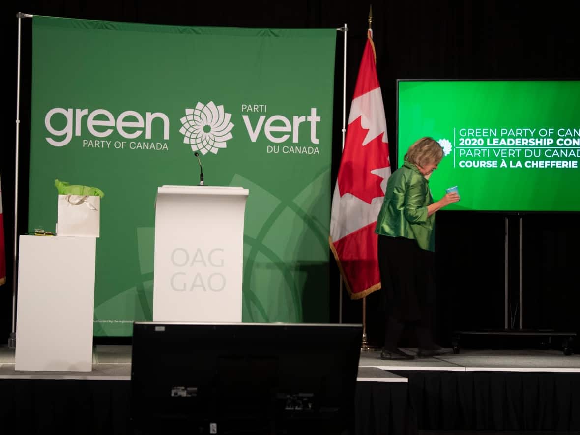 Elizabeth May leaves the stage after speaking ahead of an announcement related to the party's leadership race in Ottawa on Oct. 3, 2020. (Adrian Wyld/The Canadian Press - image credit)
