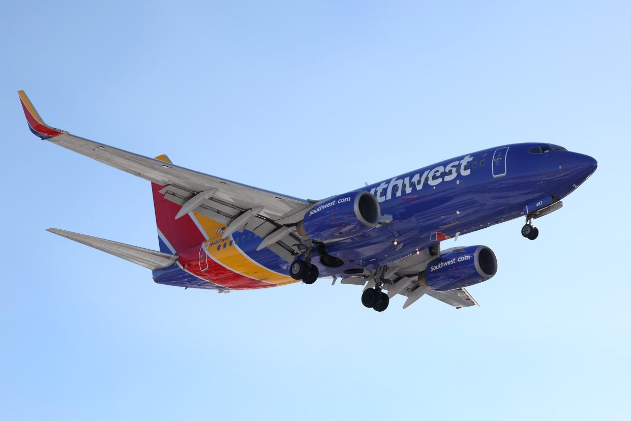 A Southwest Airlines jet lands at Midway International Airport on January 28, 2021 in Chicago, Illinois.