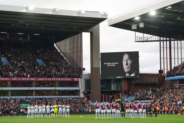 Players and fans observe a tribute to the late Sir Bobby Charlton at Villa Park