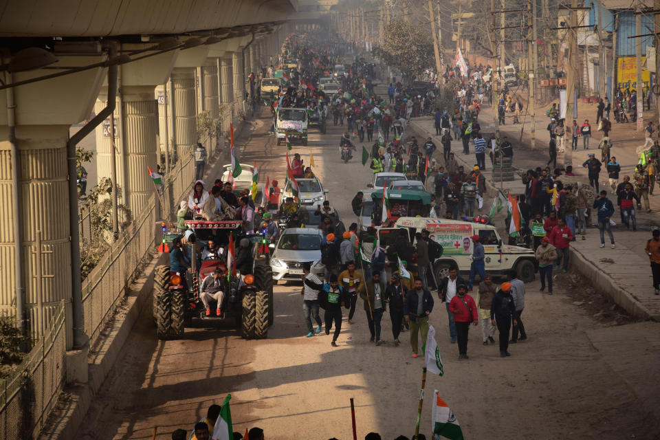 Farmers' Tractors Parade at the Tikri border during the...