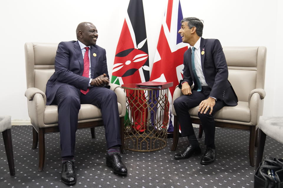 FILE - Britain's Prime Minister Rishi Sunak, right, talks with Kenya's President William Ruto during their meeting at the COP27 summit, in Sharm el-Sheikh, Egypt, Nov. 7, 2022. In his first month as Britain's prime minister, Rishi Sunak has stabilized the economy, reassured allies from Washington to Kyiv and even soothed the European Union after years of sparring between Britain and the bloc. But Sunak’s challenges are just beginning. He is facing a stagnating economy, a cost-of-living crisis – and a Conservative Party that is fractious and increasingly unpopular after 12 years in power. (Stefan Rousseau/Pool Photo via AP, File)