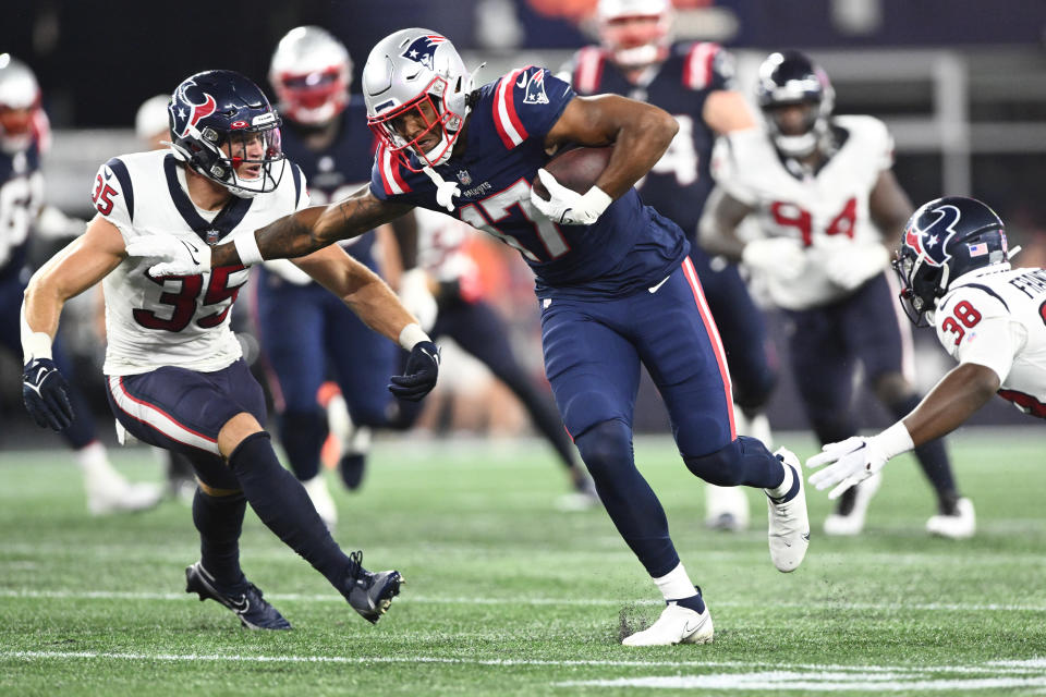 Aug 10, 2023; Foxborough, Massachusetts, USA; New England Patriots tight end Scotty Washington (17) runs against Houston Texans linebacker Jake Hansen (35) during the second half at Gillette Stadium. Mandatory Credit: Brian Fluharty-USA TODAY Sports