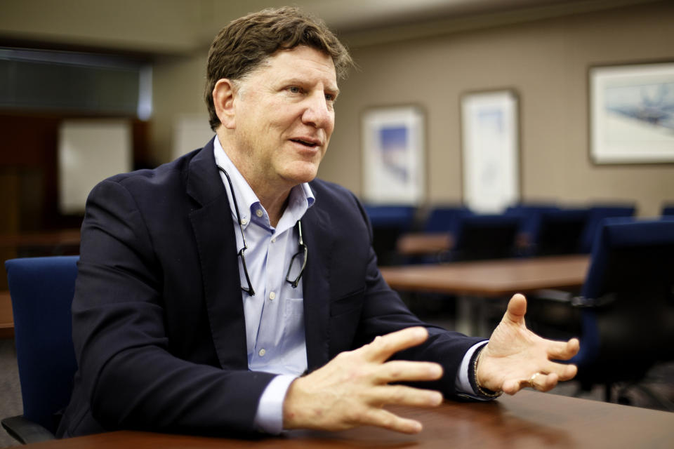 FILE - Tennessee Valley Authority President Jeffrey Lyash speaks with the Times Free Press from the TVA Chattanooga Office Complex on Tuesday, April 23, 2019 in Chattanooga, Tenn. The nation's largest public utility has proposed building a $216 million solar farm project in Kentucky atop a capped coal ash storage pit at one of its coal-fired power plants. The federal Tennessee Valley Authority voted Thursday, Nov. 10, 2022 to advance the initiative at Shawnee Fossil Plant in Paducah. (C.B. Schmelter/Chattanooga Times Free Press via AP, File)