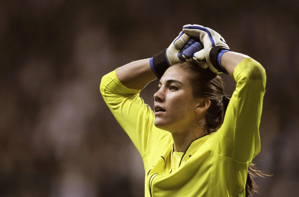 U.S. goalkeeper Hope Solo reacts after being defeated in a penalty shootout against Japan during their Women's World Cup final soccer match in Frankfurt in this file photo from July 17, 2011. Solo was arrested June 20, 2014 for allegedly striking her sister and her nephew during a dispute at her home in a Seattle suburb, police told the Seattle Times. REUTERS/Alex Domanski/Files (GERMANY - Tags: SPORT SOCCER WORLD CUP CRIME LAW)