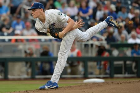 Jun 21, 2018; Omaha, NE, USA; Florida Gators pitcher Jack Leftwich (23) pitches against the Texas Tech Red Raiders in the first inning in the College World Series at TD Ameritrade Park. Mandatory Credit: Steven Branscombe-USA TODAY Sports