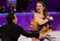 <p>Ukraine’s Maxim Nikitin and Alexandra Nazarova perform during the ice dance short dance of the figure skating event during the Pyeongchang 2018 Winter Olympic Games at the Gangneung Ice Arena in Gangneung on February 19, 2018. / AFP PHOTO / Roberto SCHMIDT </p>