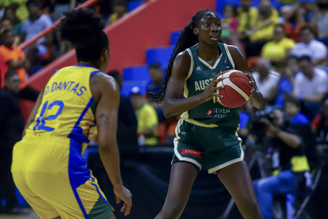 Australia's player Ezi Magbegor controls the ball during the women's Pre-olympic Tournament match between Brazil and Australia at the Arena Guilherme Paraense in Belem, Para state, Brazil on February 8, 2024. (Photo by THIAGO GOMES / AFP) (Photo by THIAGO GOMES/AFP via Getty Images)