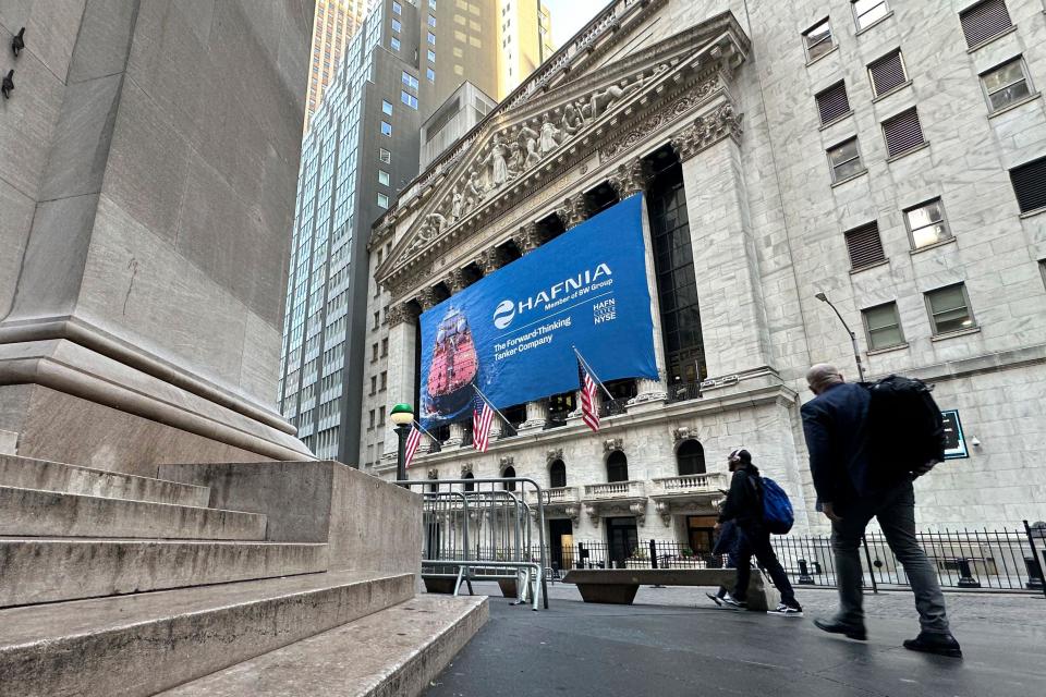 People walk past the New York Stock Exchange Tuesday, April 9, 2024 in New York.European equities have dipped in early trading while Asian stocks closed mostly higher, with investors mainly focusing on a U.S. inflation report and what it means for interest rate cuts by the Federal Reserve. (AP Photo/Peter Morgan)