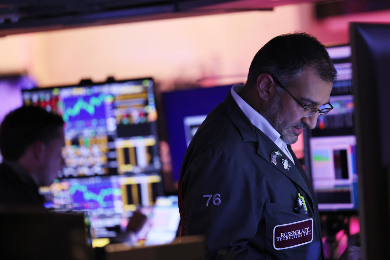 NEW YORK, NEW YORK - OCTOBER 03: Traders work on the floor of the New York Stock Exchange during afternoon trading on October 03, 2022 in New York City. Stocks closed up on the first day of trading in October, starting the fourth quarter of the year on a positive note.  (Photo by Michael M. Santiago/Getty Images)