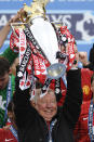 Sir Alex Ferguson wins the EPL title in his last year as coach of Manchester United during the 2012-13 season. Image: Getty