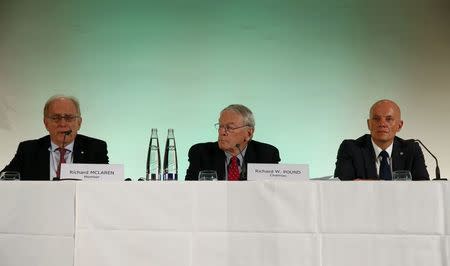 World Anti-Doping Agency's (WADA) former president, Dick Pound (C), who heads the commission into corruption and doping in athletics, and commission members Richard McLaren (L) and Guenter Younger, address a news conference in Unterschleissheim near Munich, Germany, January 14, 2016.REUTERS/Michael Dalder