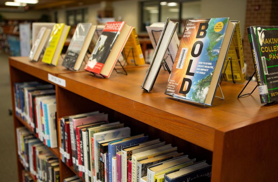 Books at Vandegrift High School's library on March 2, 2022. A new Texas law requires book vendors to apply ratings to all titles before hitting bookshelves.