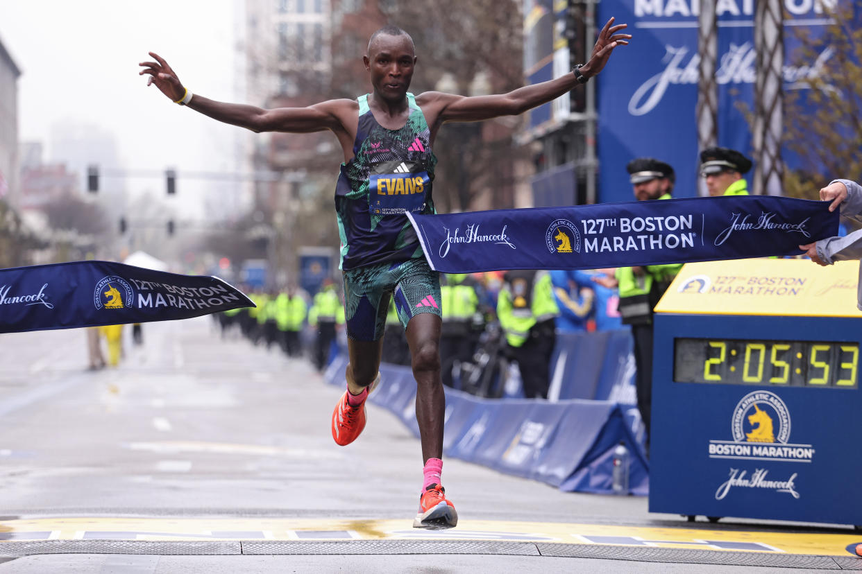 BOSTON, MASSACHUSETTS - APRIL 17: Evans Chebet of Kenya crosses the finish line and takes first place in the professional Men's Division during the 127th Boston Marathon on April 17, 2023 in Boston, Massachusetts. (Photo by Maddie Meyer/Getty Images)