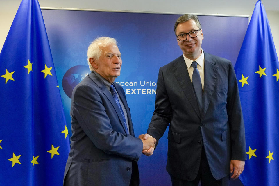 FILE - Serbia's President Aleksandar Vucic, right, shakes hands with European Union foreign policy chief Josep Borrell prior to a meeting in Brussels, Thursday, Sept. 14, 2023. Kosovo’s Prime Minister on Monday, Sept. 18, 2023, accused the European Union special envoy in the normalization talks with Serbia of not being “neutral and correct” and “coordinating” with Belgrade against Pristina. EU foreign policy chief Josep Borrell, who supervised the talks in Brussels, blamed the latest breakdown on Kurti’s insistence that Serbia should essentially recognize his country before progress could be made on enforcing a previous agreement reached in February. (AP Photo/Virginia Mayo, File)