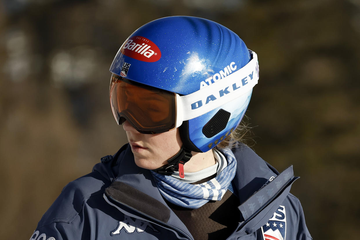 United States' Mikaela Shiffrin concentrates ahead of an alpine ski, women's World Cup downhill race, in Cortina d'Ampezzo, Italy, Friday, Jan. 26, 2024. Shiffrin crashed into the safety nets after losing control landing a jump during a World Cup downhill on Friday. (AP Photo/Gabriele Facciotti)