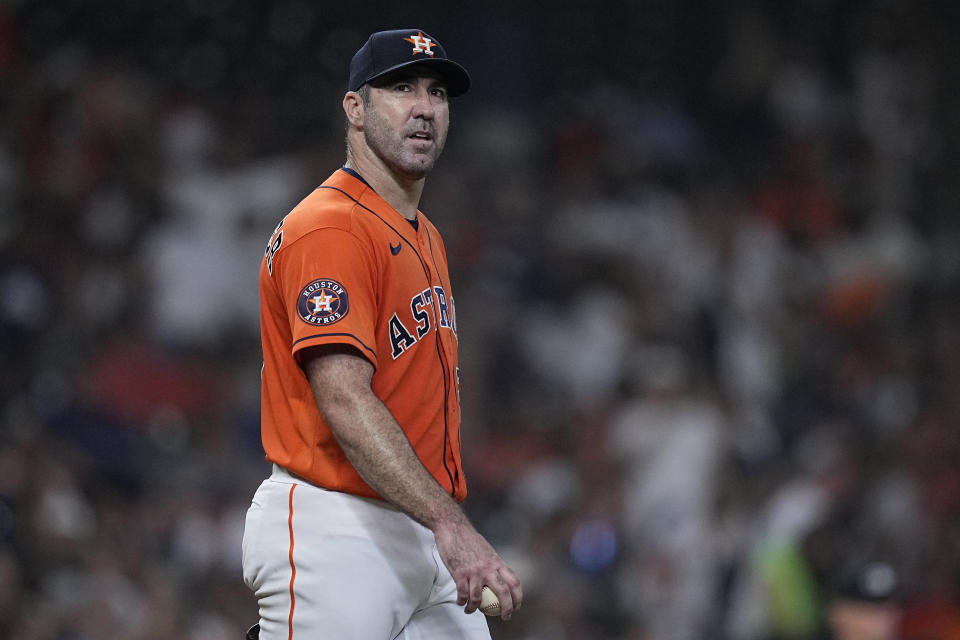 Houston Astros starting pitcher Justin Verlander pauses after giving up a two-run home run to New York Yankees' Giancarlo Stanton during the third inning of a baseball game Friday, Sept. 1, 2023, in Houston. (AP Photo/Kevin M. Cox)