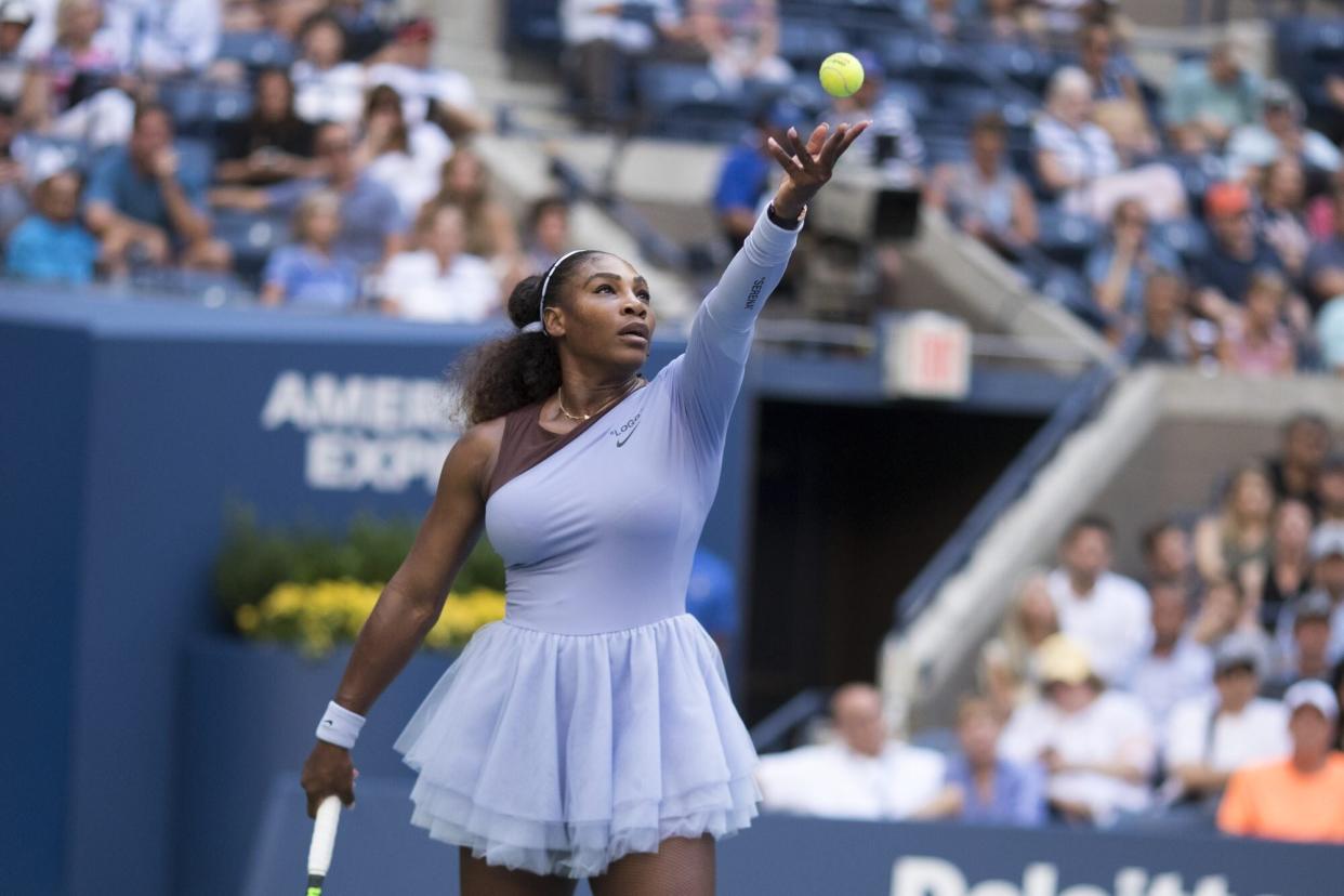 Serena Williams in a lavender tennis dress