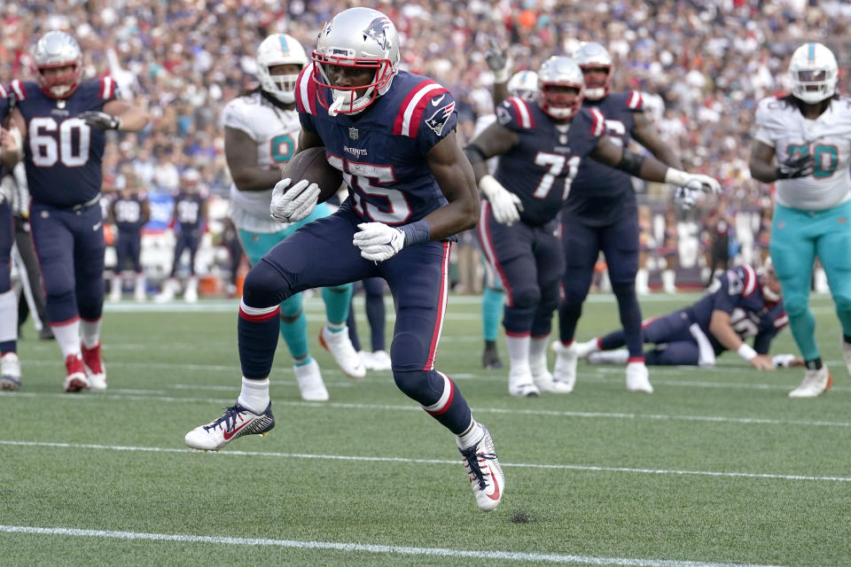 New England Patriots wide receiver Nelson Agholor (15) heads for the end zone after a touchdown pass from New England Patriots quarterback Mac Jones during the first half of an NFL football game against the Miami Dolphins, Sunday, Sept. 12, 2021, in Foxborough, Mass. (AP Photo/Steven Senne)