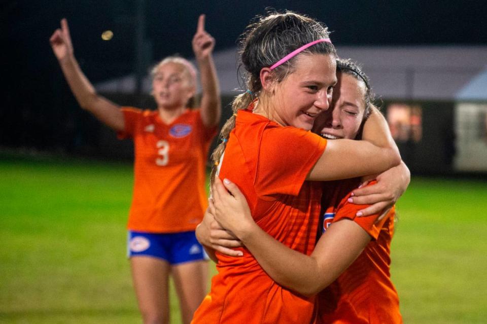 Members of the Gulfport girls soccer team celebrate after winning the 6A South State Championship game against Ocean Springs in Gulfport on Tuesday, Jan. 31, 2023. The team will advance to the state championship.